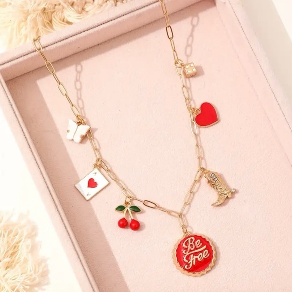 Gold toned dainty and fun Charm Necklace cherries, heart, boot and butterfly - Picture 14 of 16